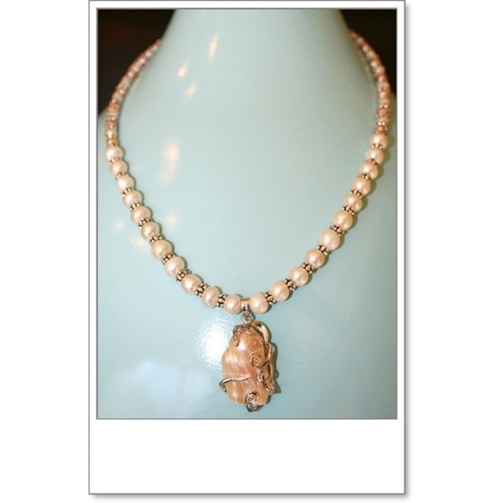 Hand‎ made White fresh water pearls with sterling silver beaded rondelle